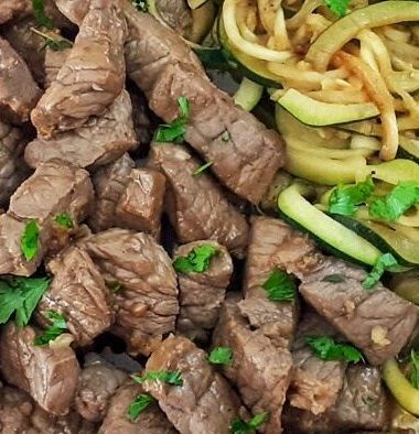 GARLIC BUTTER STEAK BITES WITH ZUCCHINI NOODLES